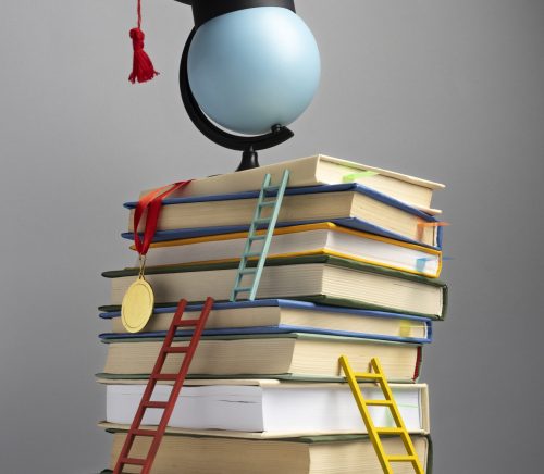 front-view-stacked-books-graduation-cap-ladders-education-day